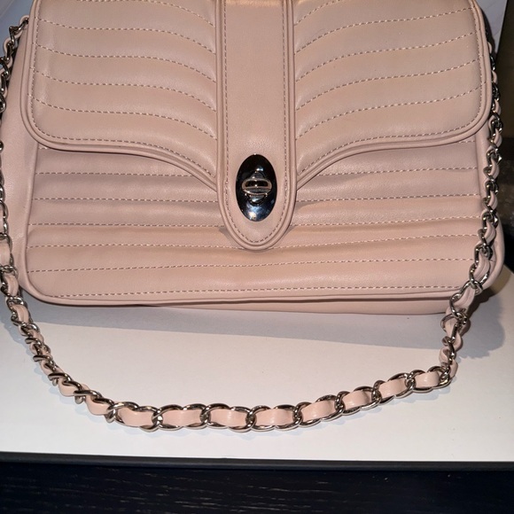 Express Blush Quilted Convertible
Shoulder | Crossbody Purse - Picture 1 of 6